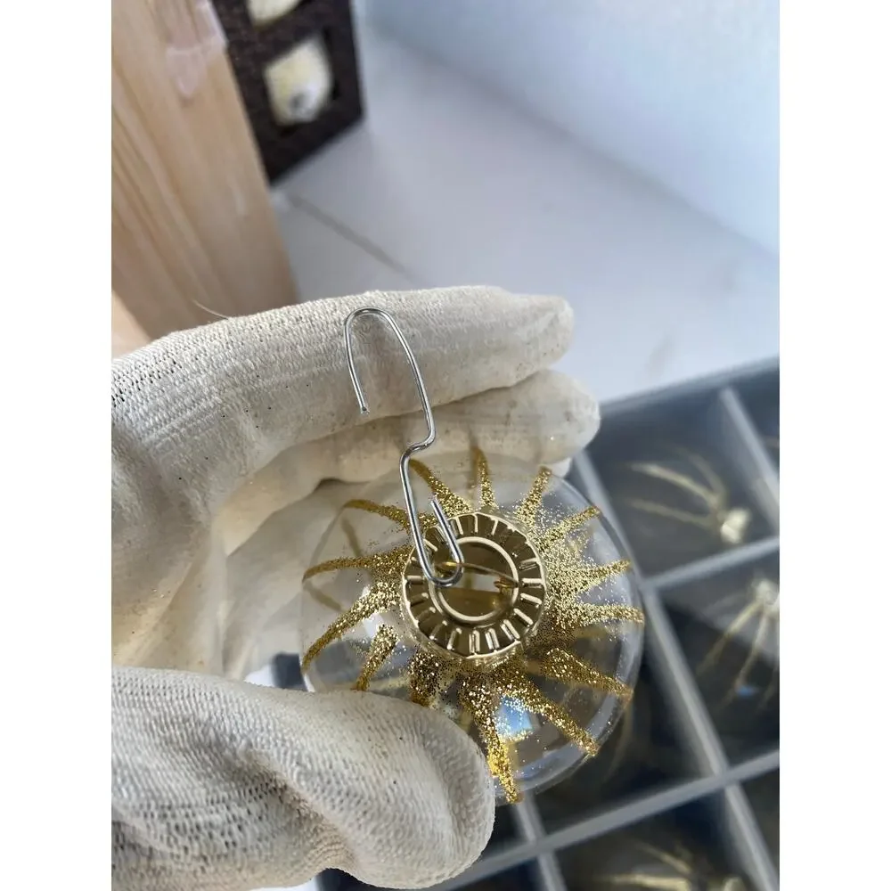 set of 12 glass Christmas ball ornaments featuring a dark tinted or smoked glass
